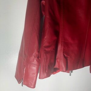 Genuine , leather jacket, medium size, rarely worn, red, pockets inside,